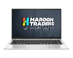 Laptop displaying the Haroon Traders logo on a white background